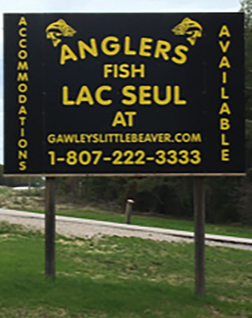 A sign at Gawleys Little Beaver Camp that reads Anglers Fish Lac Seul at Gawleyslittlebeaver.com